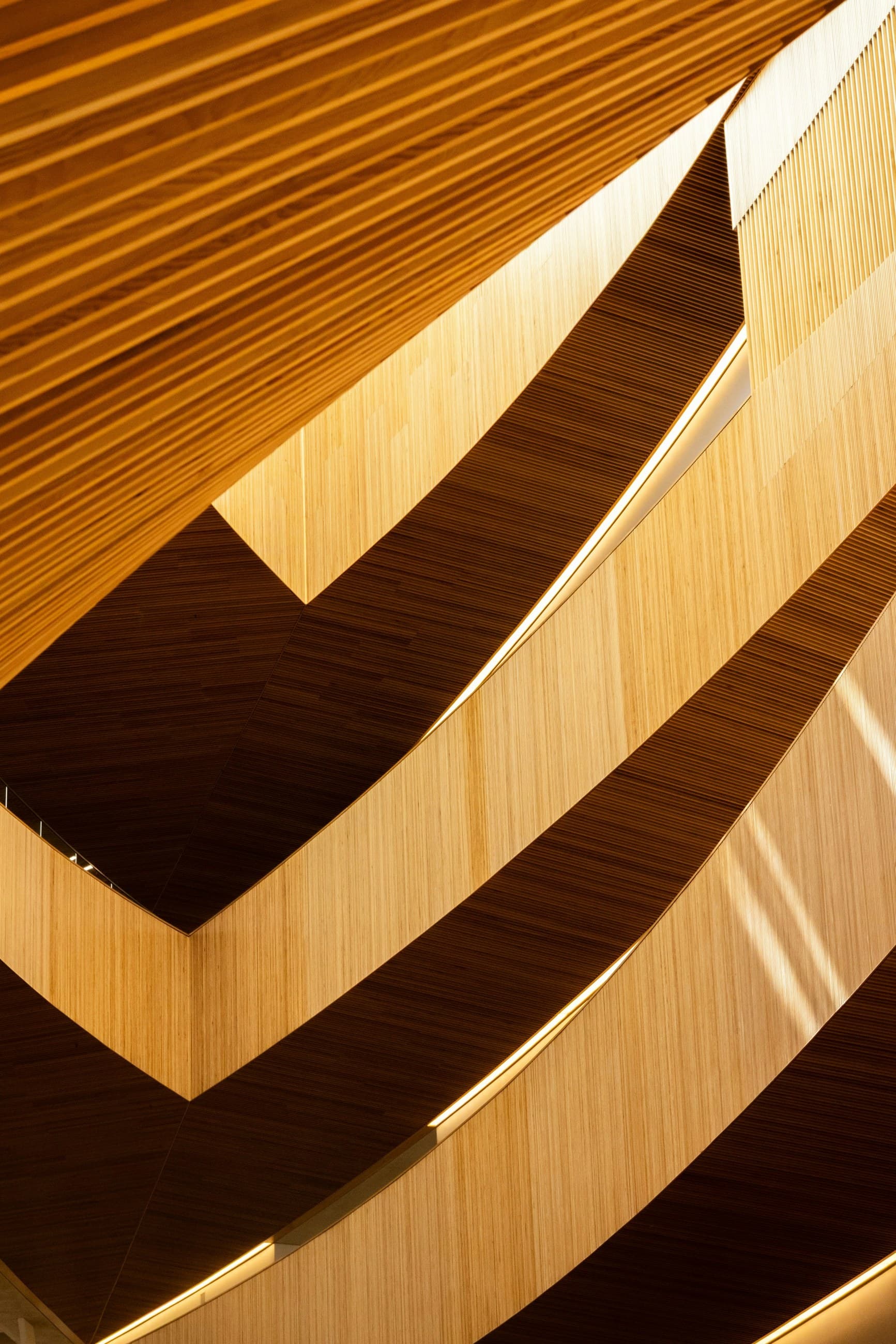 Abstract geometric pattern of light and dark wooden slats in a modern interior